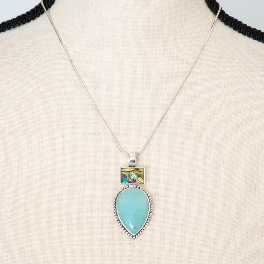 Southwestern pendant turquoise look pear stone, silver look accents Roman stamp - Picture 2 of 11